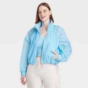 Women All In Motion Windbreaker Jacket. Brand new with tags . WomenXL